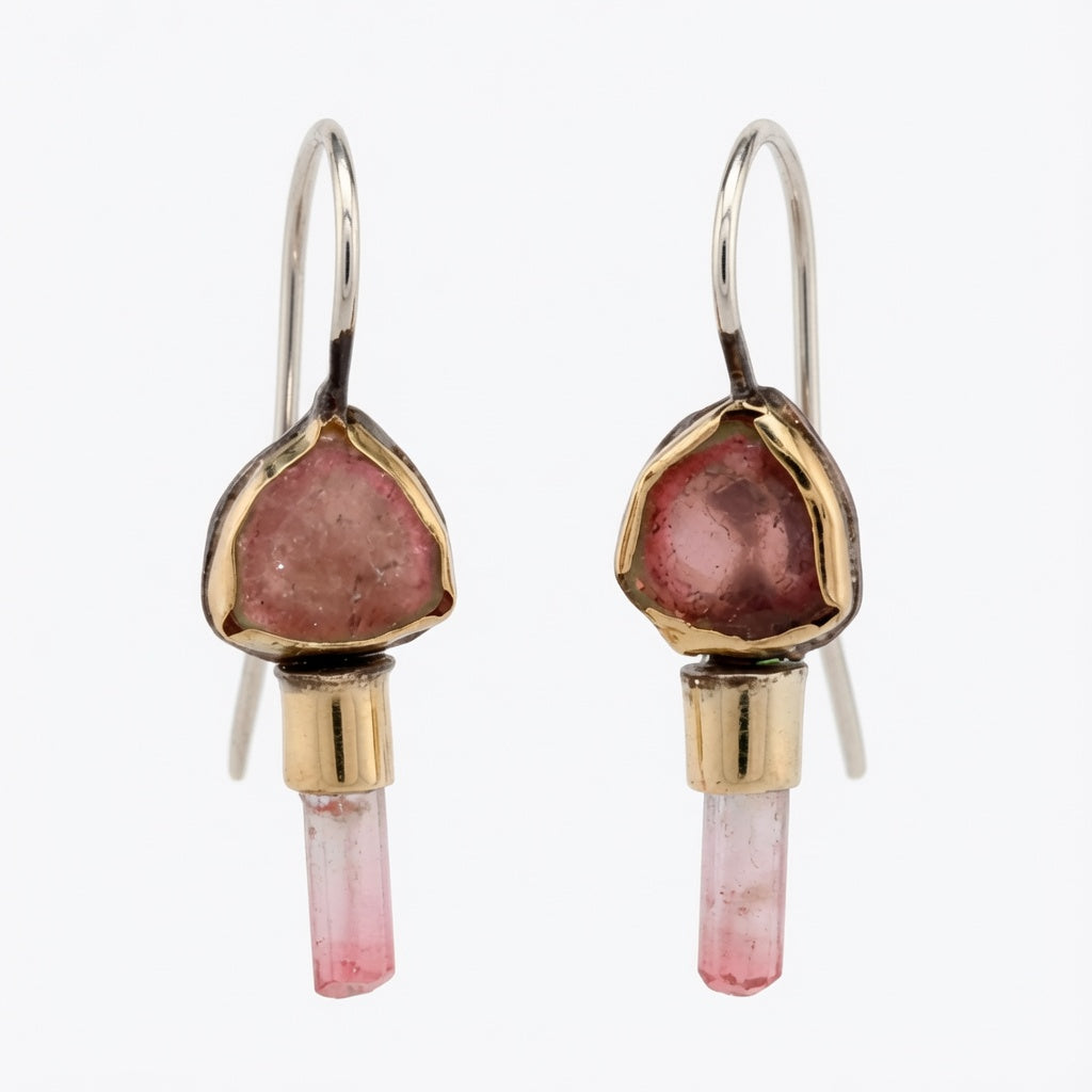 Dusty rose tourmaline in black and gold earrings