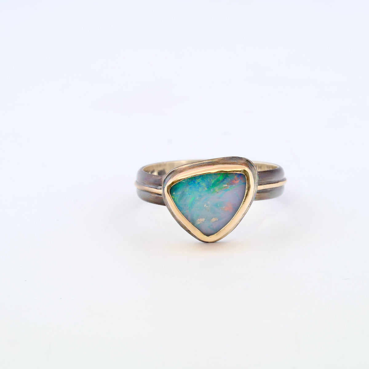 Black and Gold triangle boulder opal ring